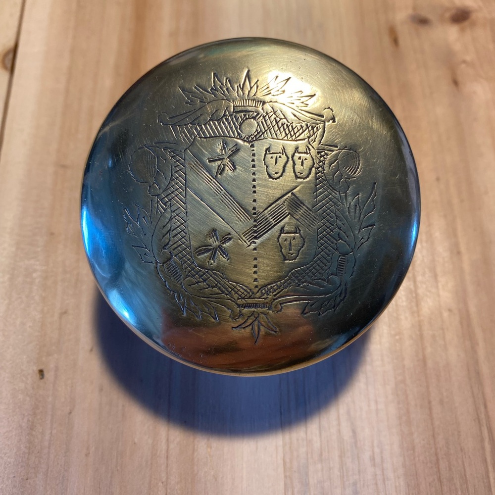 Engraved brass box.